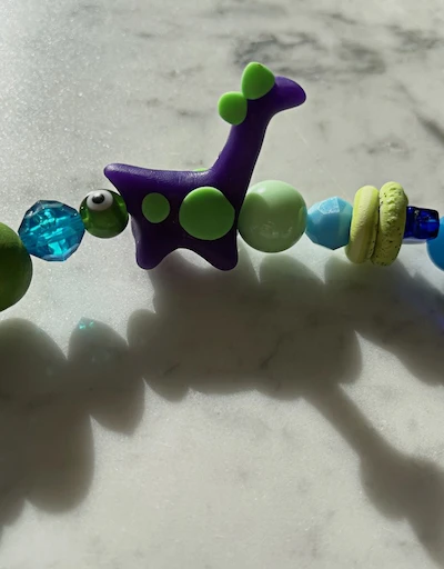 The Purple Dinosaur Necklace
