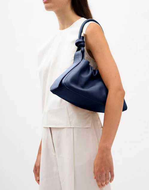 Tina Nappa Leather Ruched Baguette Bag-Navy
