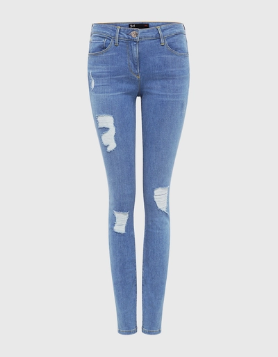 Mid Rise Distressed Skinny Jeans