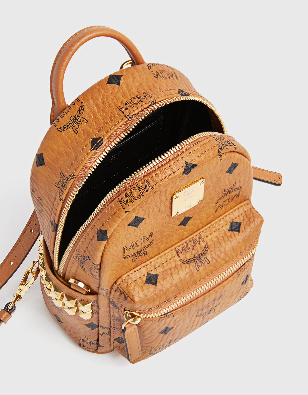 MCM Mini Stark Side Studs Backpack in Visetos Cognac - A World Of Goods For  You, LLC