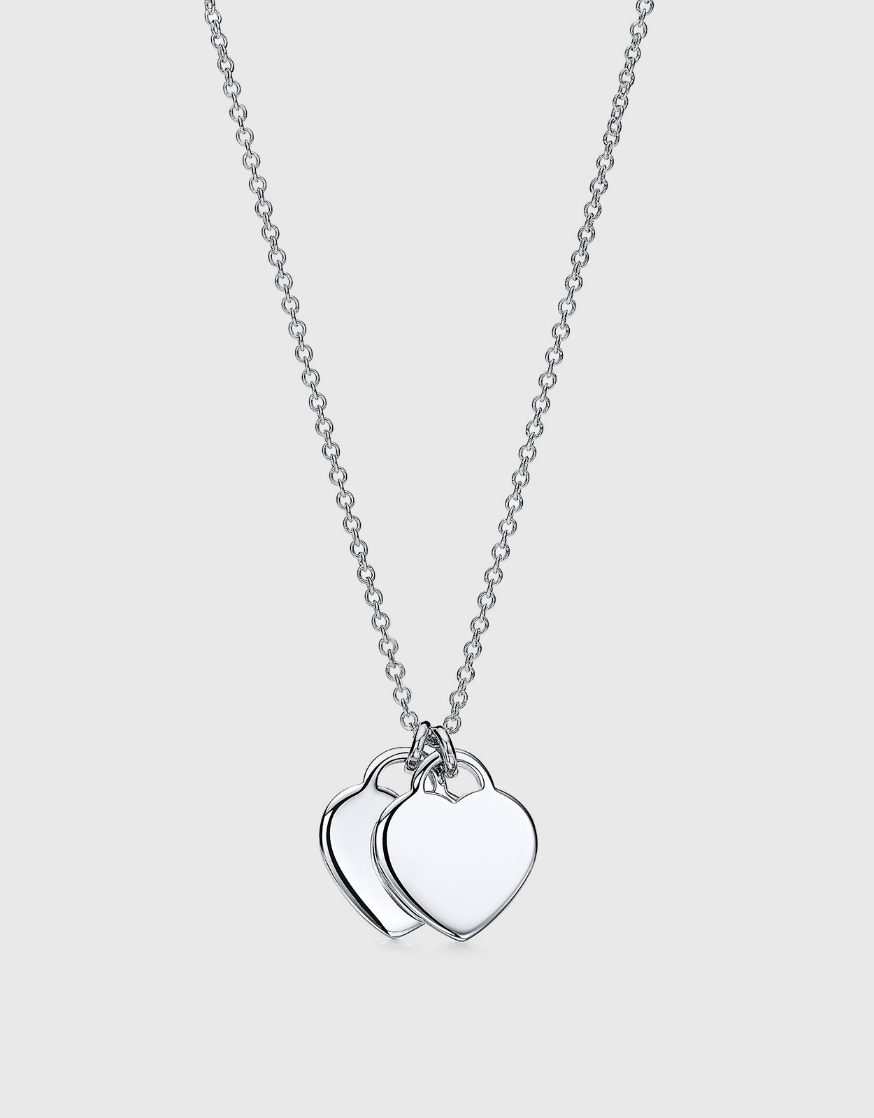 Elsa Peretti™ Open Heart pendant of black jade and sterling silver. |  Tiffany & Co.