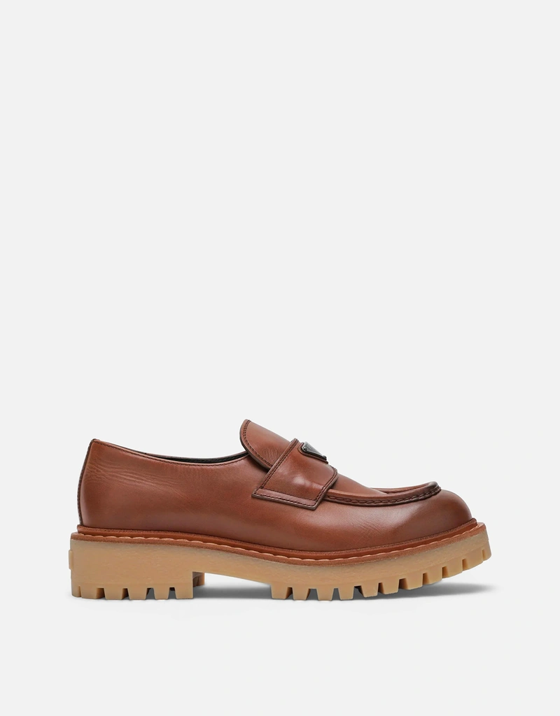 Prada メンズエボニーレザーのローファー () IFCHIC.COM